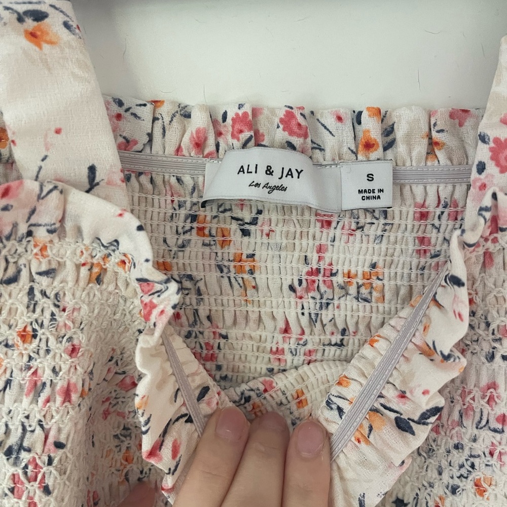 Ali & Jay drop hem dress. New